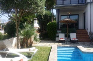 The pool is located in the back of the house, which guarantees absolute privacy